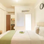 Studio Green Pramuka City Apartment With Mall Access By Travelio